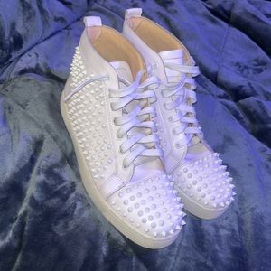 Men’s size 11 mid top Christian Louboutin spiked leather sneakers